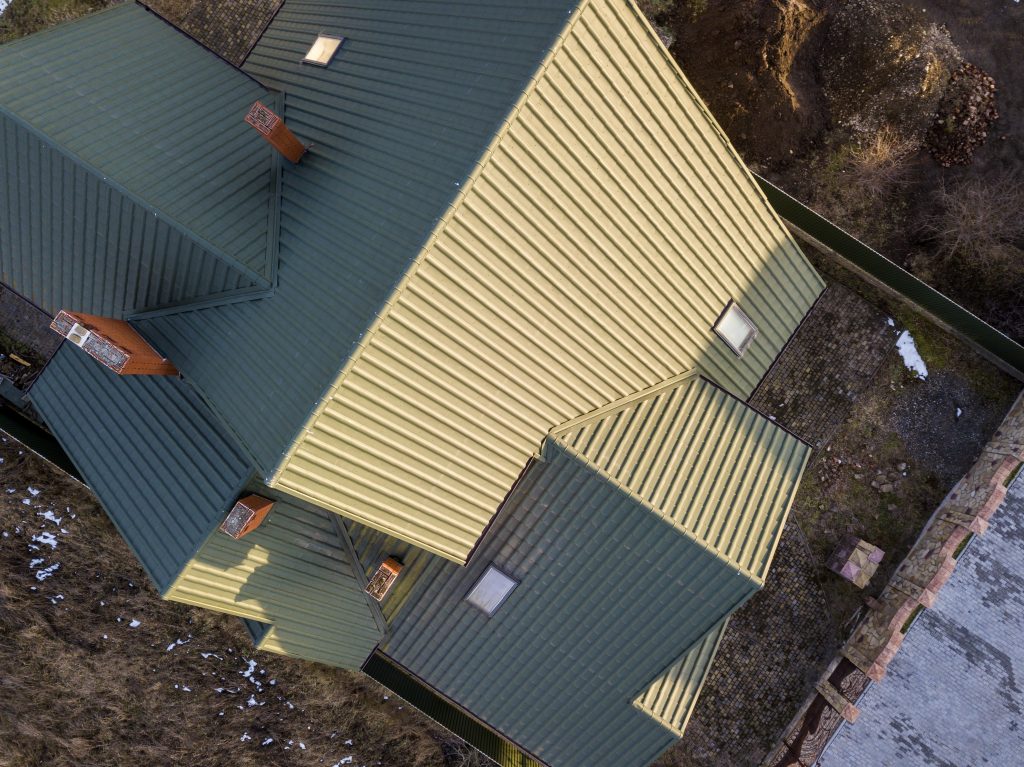 Top down image of a flat residential metal roof