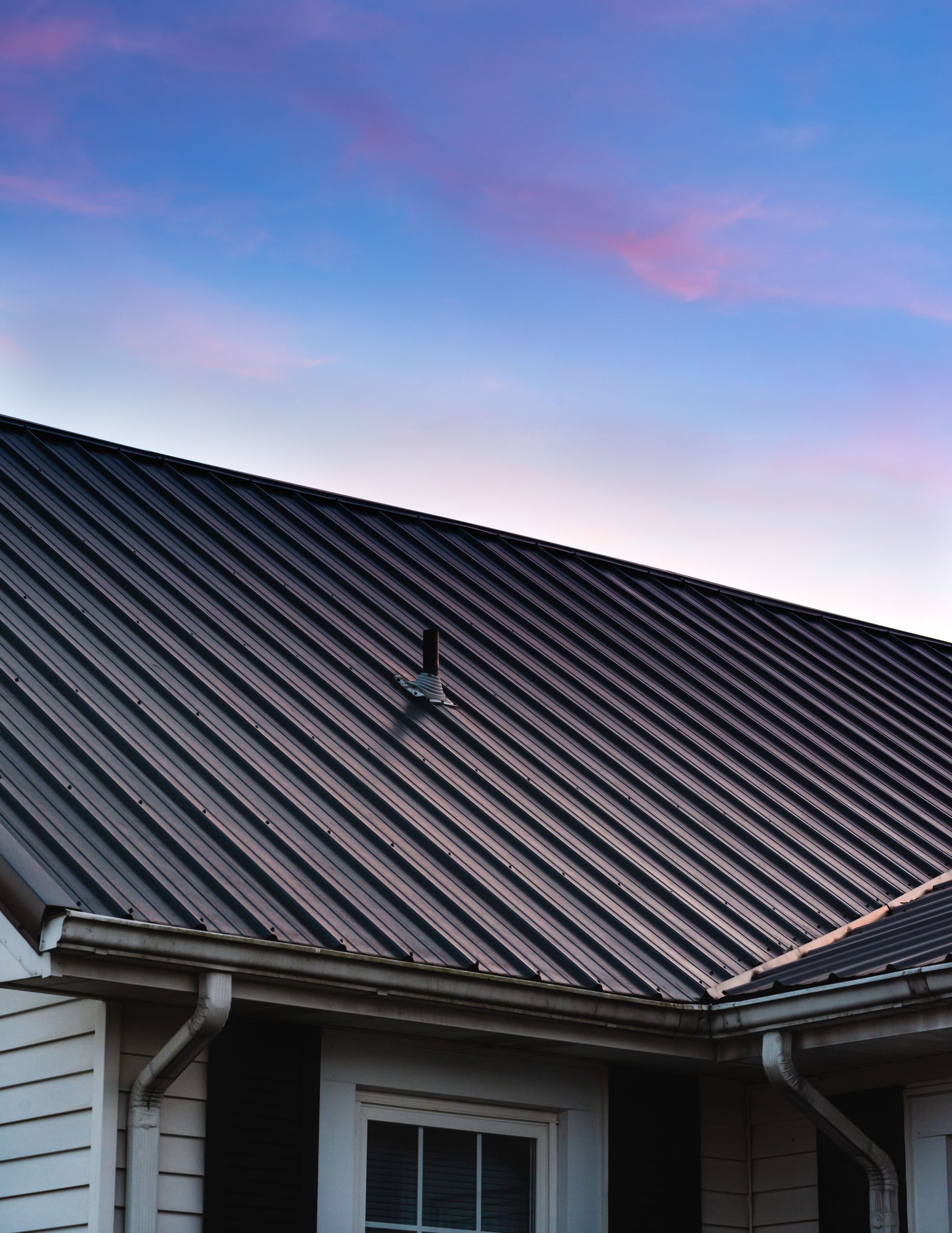Image closeup view of a black metal roof